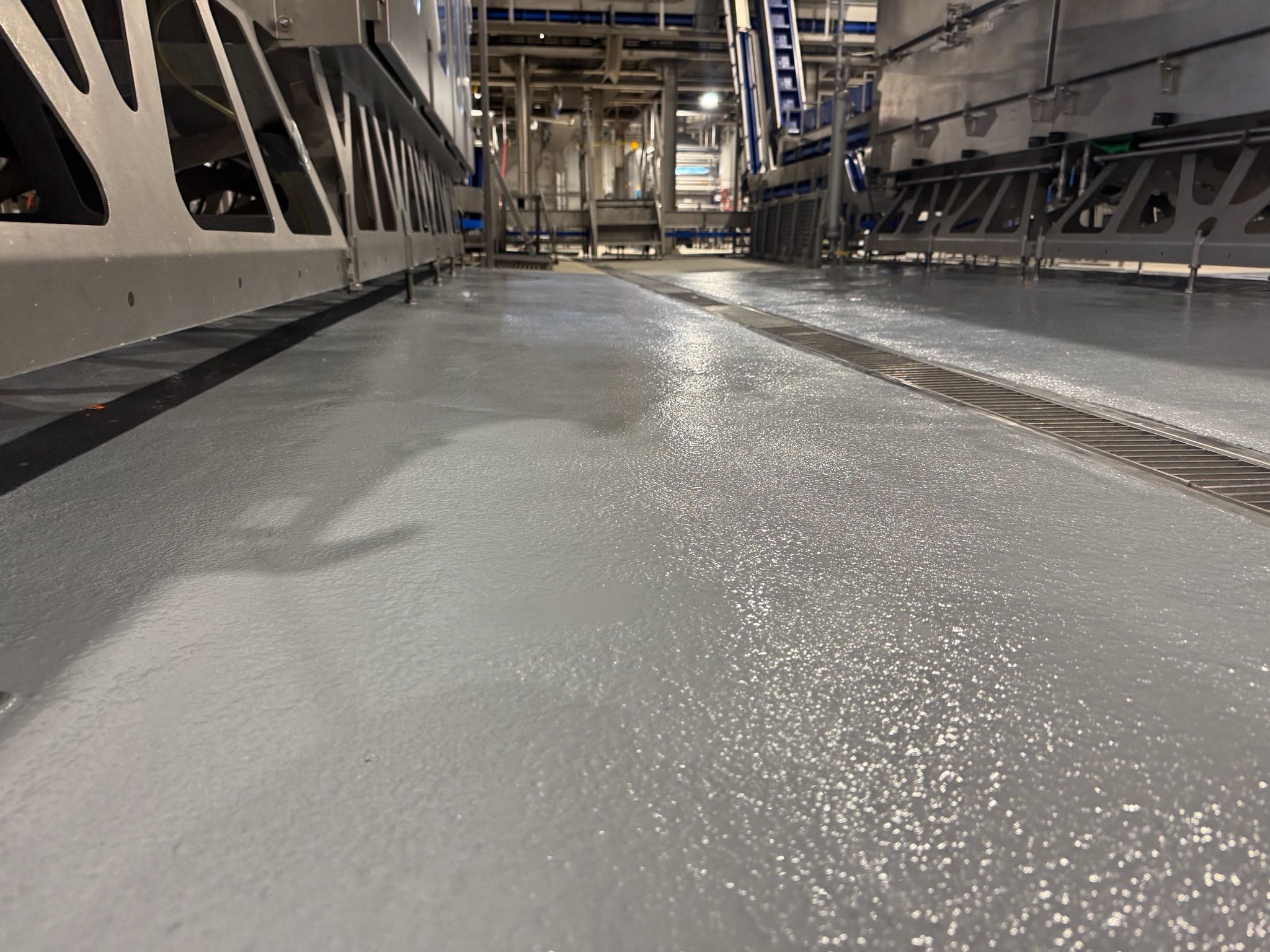 STX floor installed under processing equipment in low clearance area