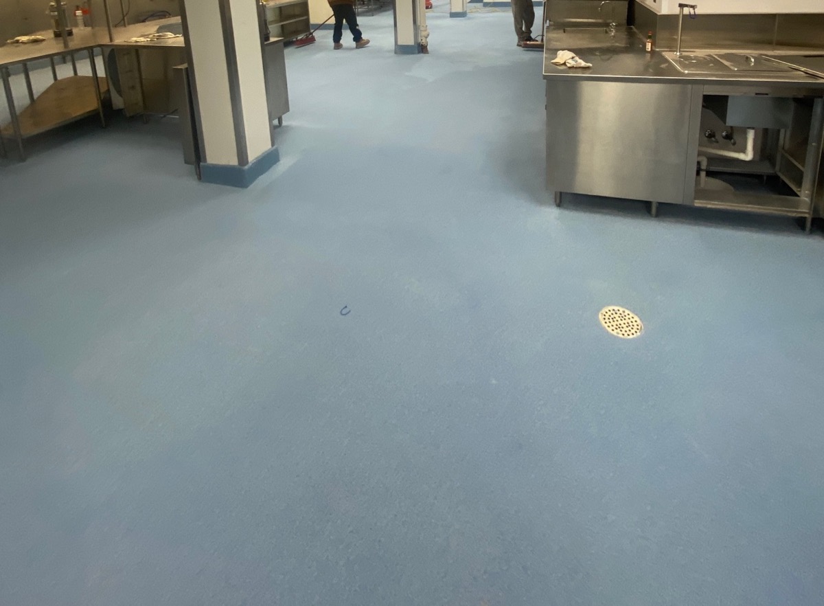 SaniQuartz decorative quartz flooring in commercial kitchen