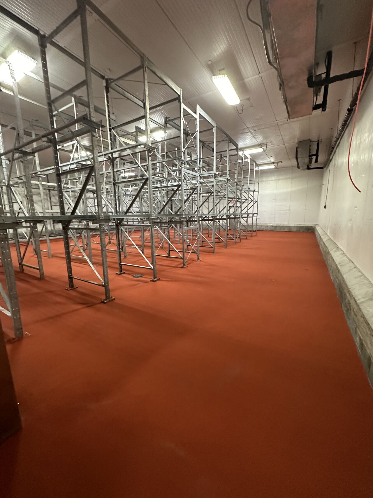 Red SaniCrete STX floor in cold storage facility